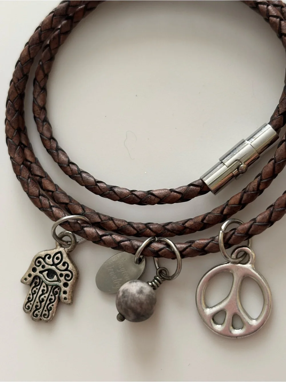 Triple Wrapped Leather Bracelet with Charms Magnetic closure.